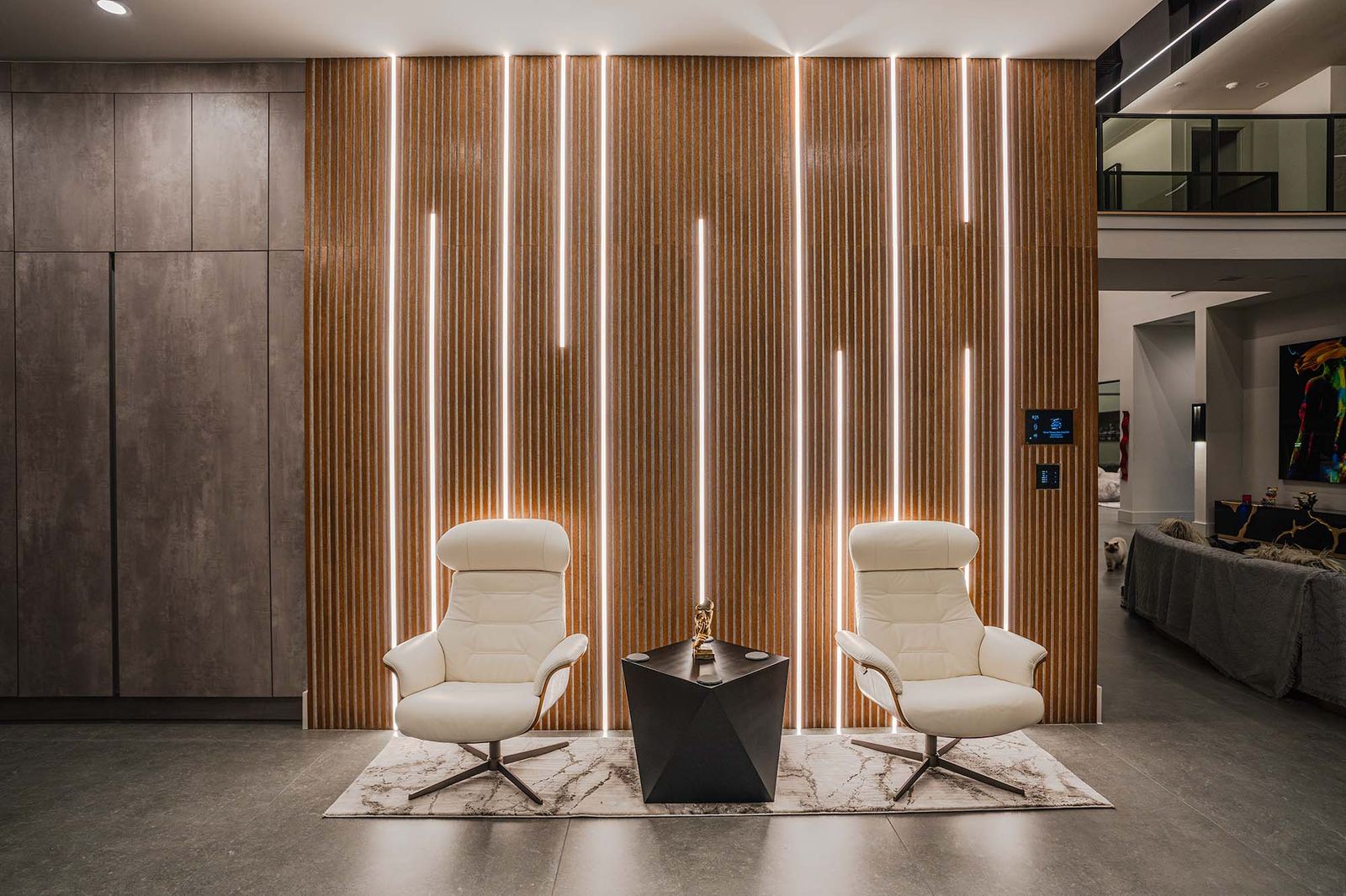 Modern living space with lit wood panels