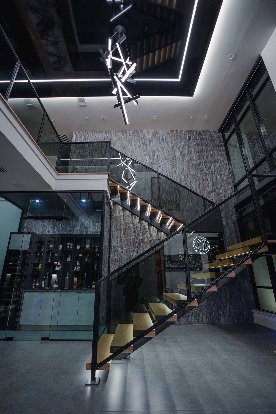 Glass and steel staircase in a modern home
