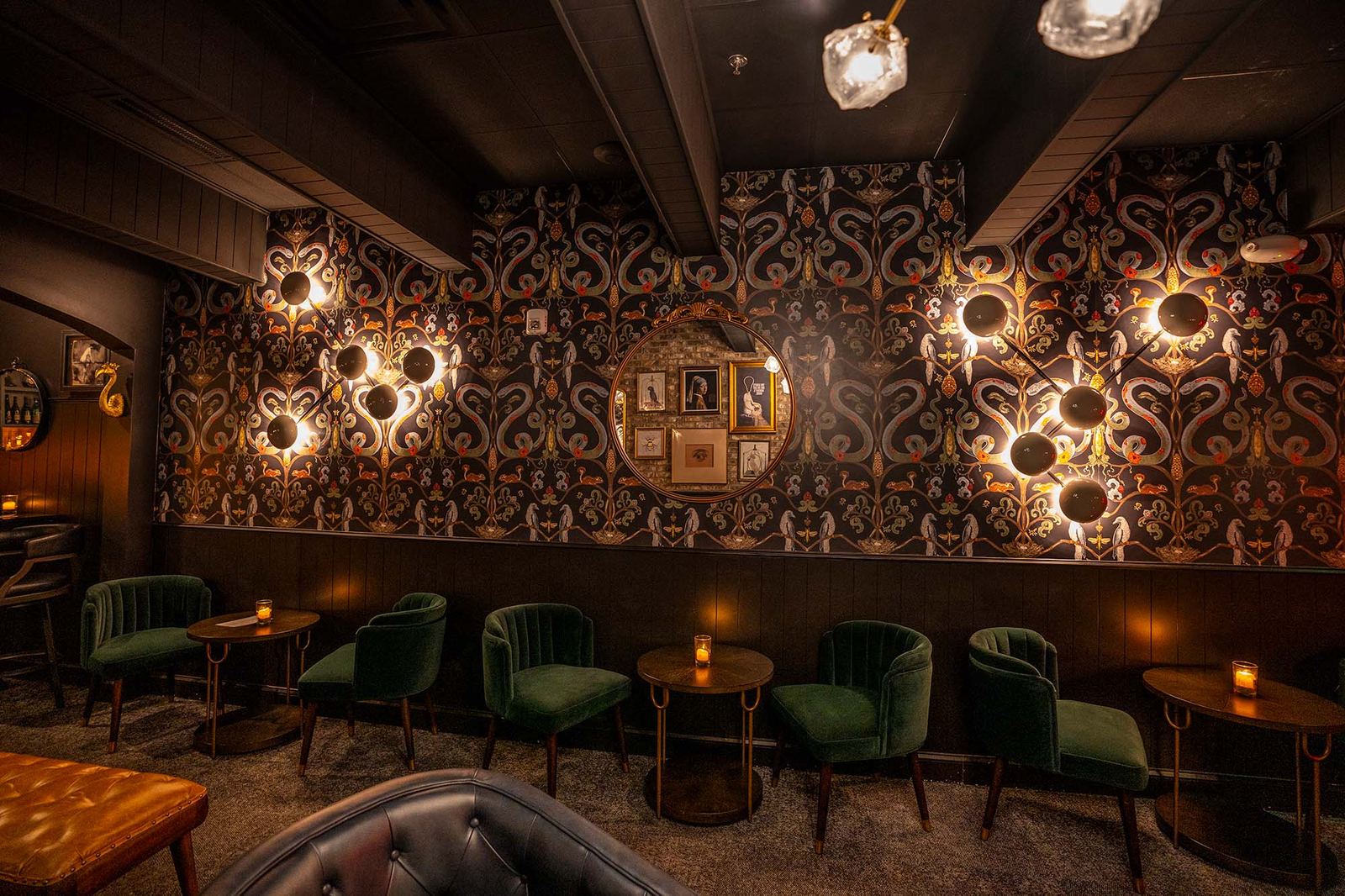 Moody bar lounge with glowing wall sconces