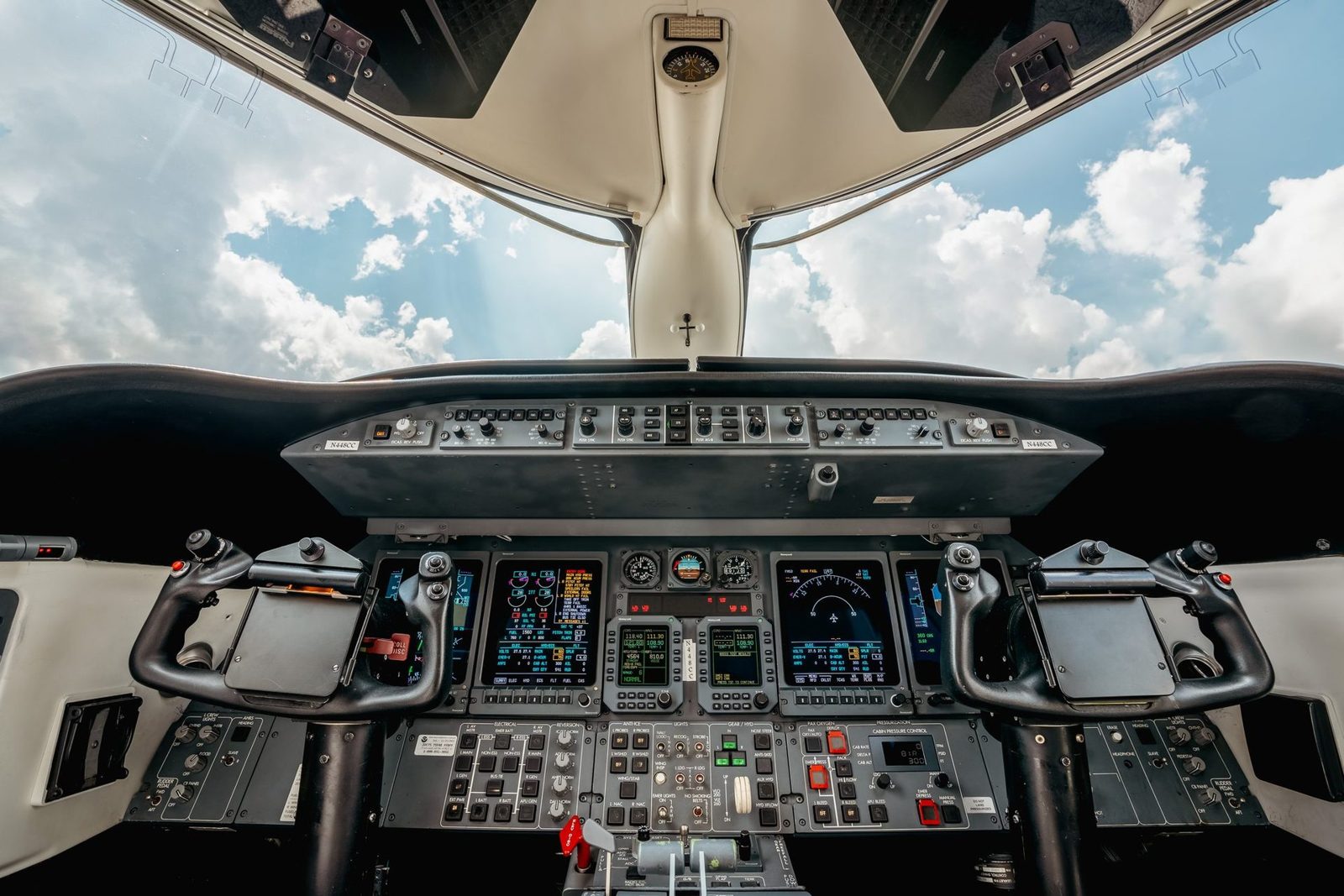Private jet cockpit with the sky through the windshield