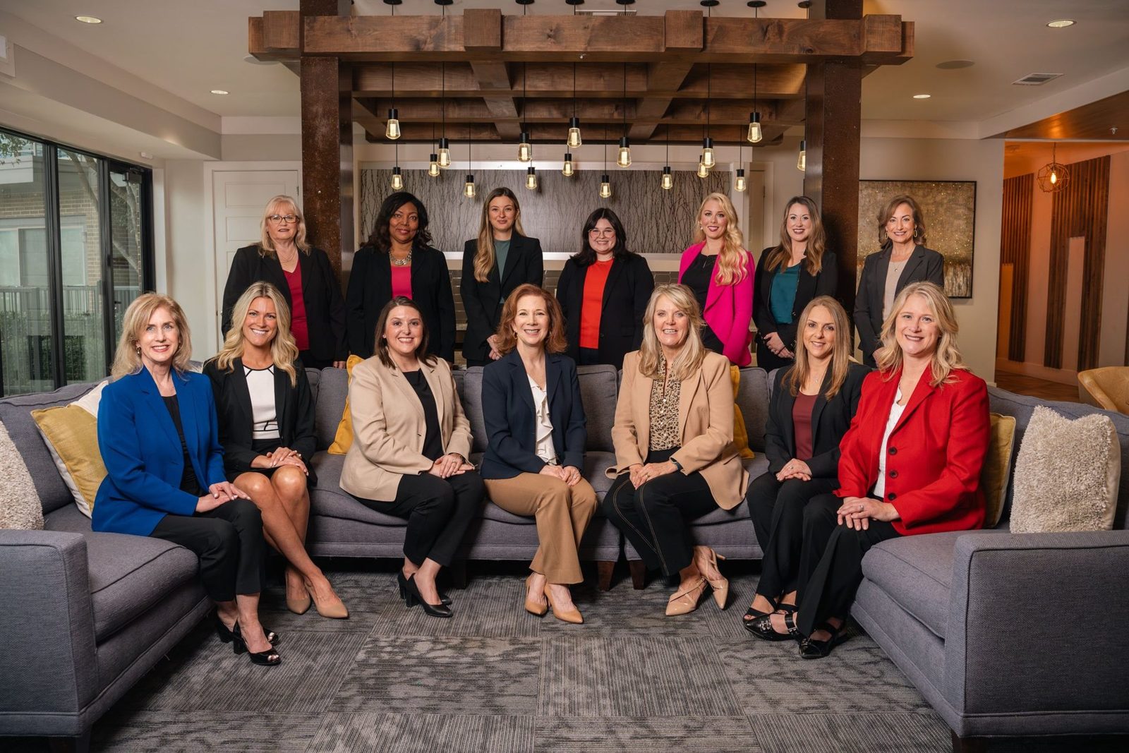 Staffing firm team seated together in a warm lounge