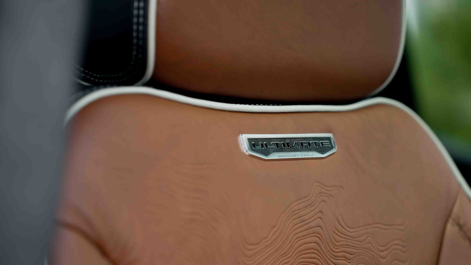 Embossed leather seat detail in a GMC Denali