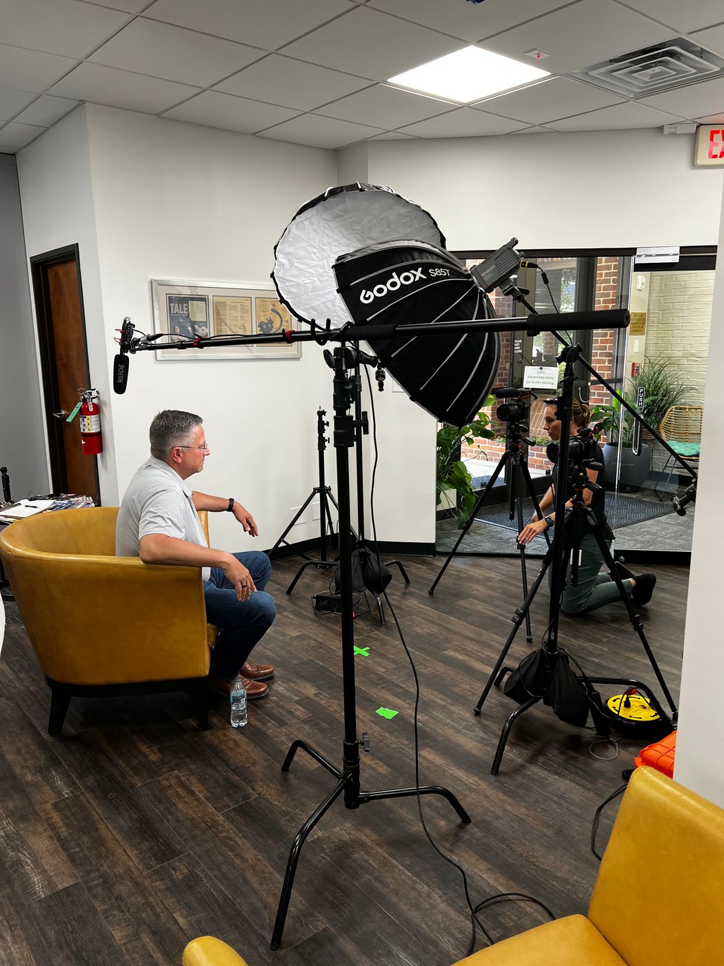 Lighting and camera set up for a C1S leadership interview in the office
