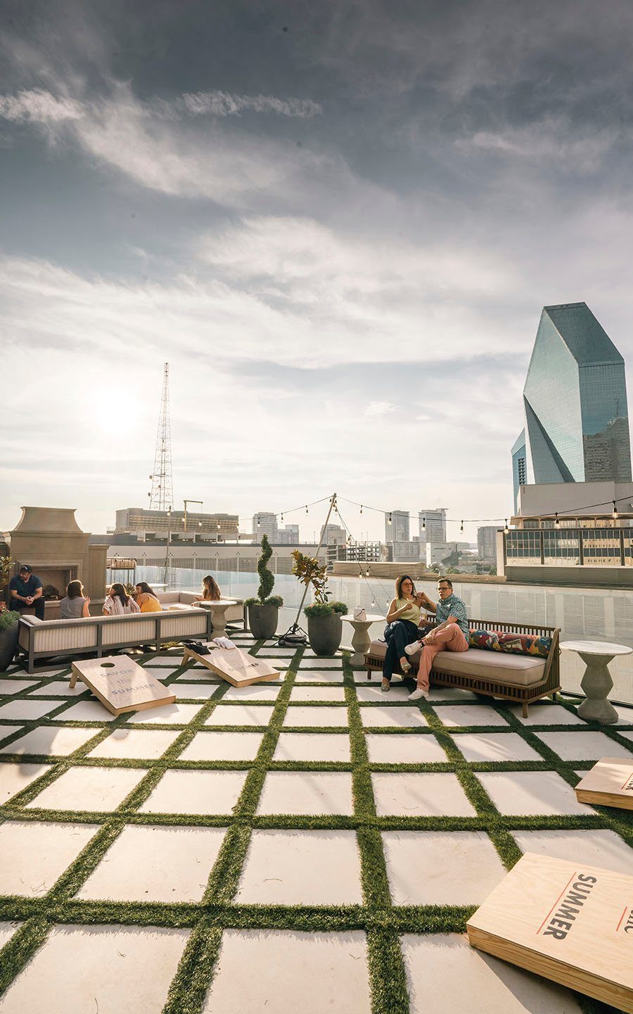 Rooftop lounge with downtown Dallas towers