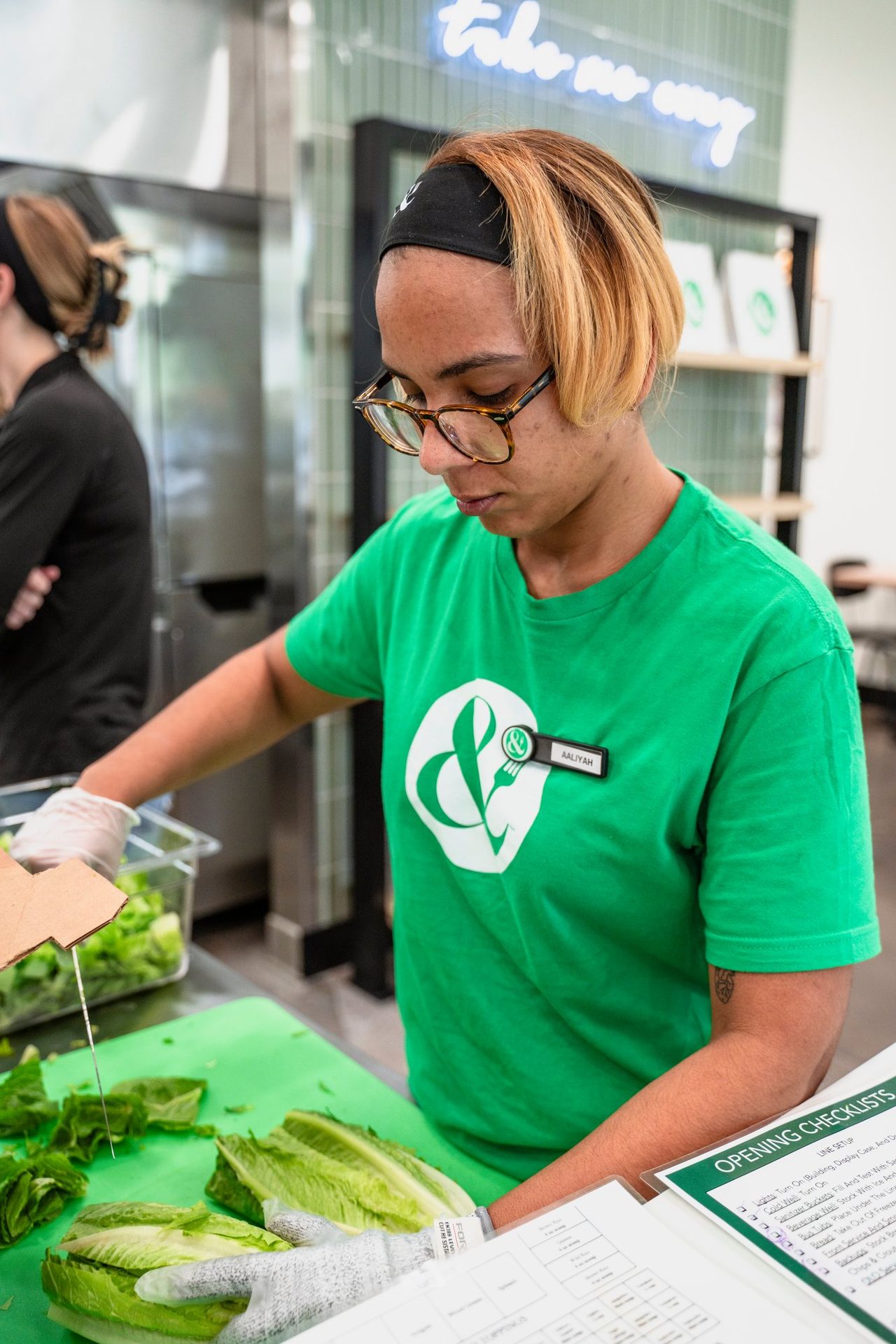 Chopping romaine at the prep station