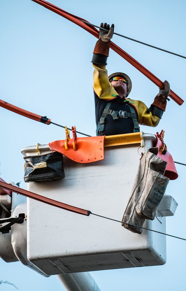 Oncor lineworker in a bucket truck