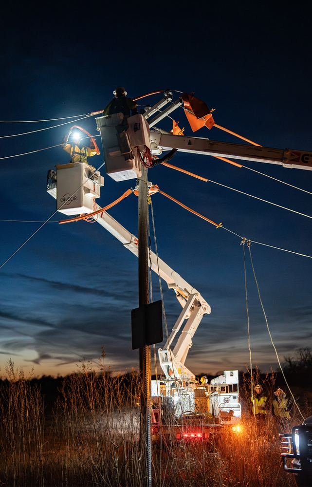 Oncor crew working on lines at night