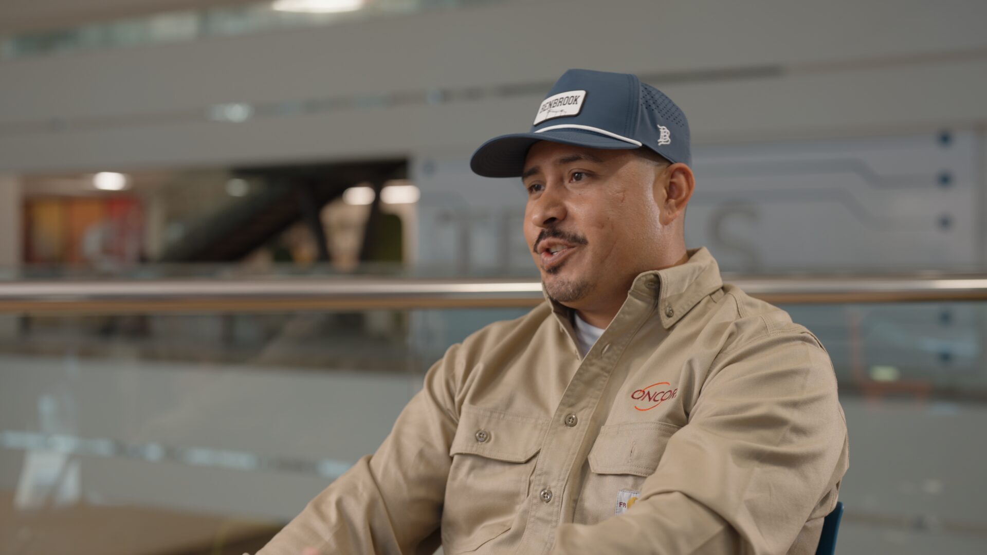 Oncor lineworker in a cap and work shirt during his Power Couples interview