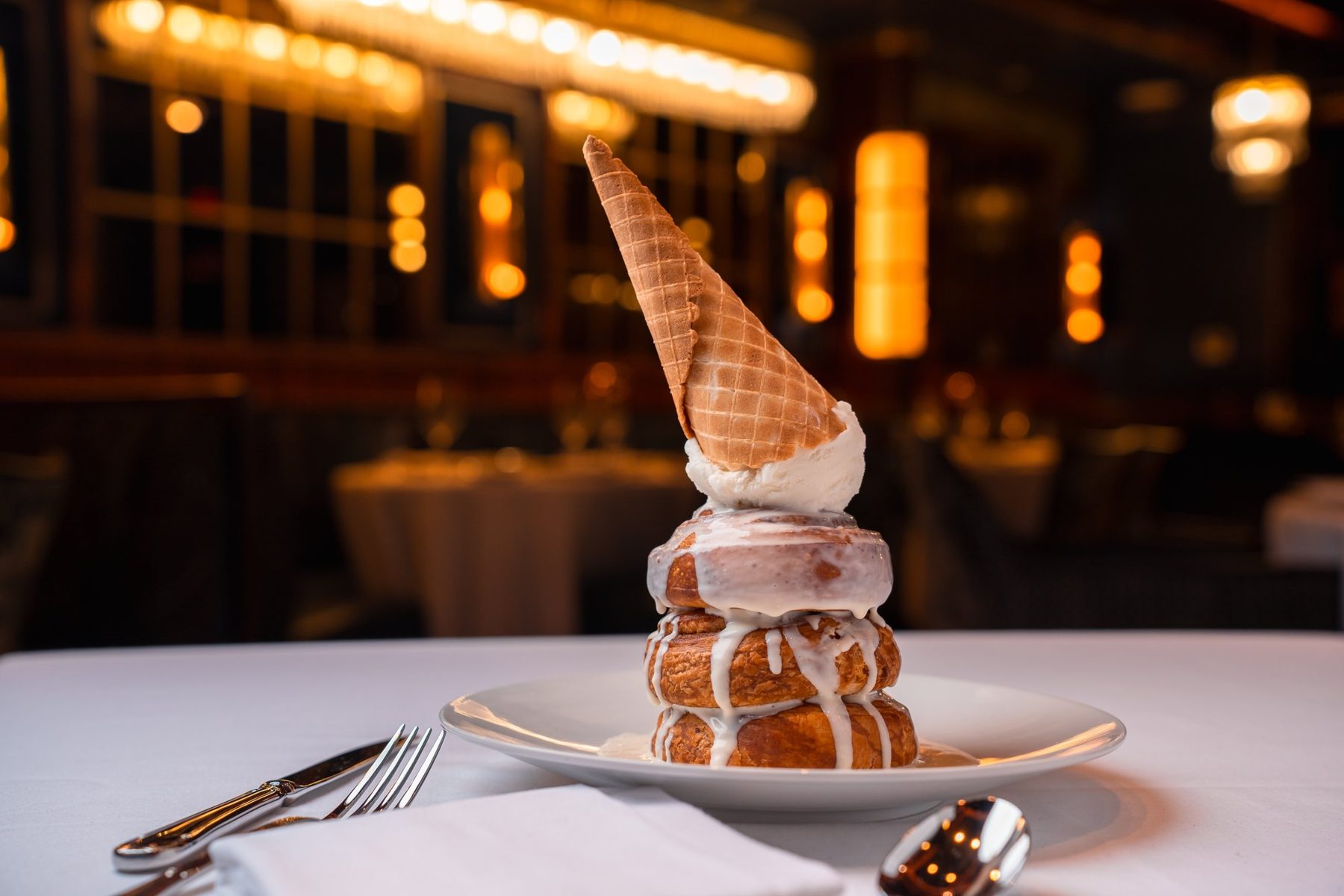 Tower dessert topped with a waffle cone