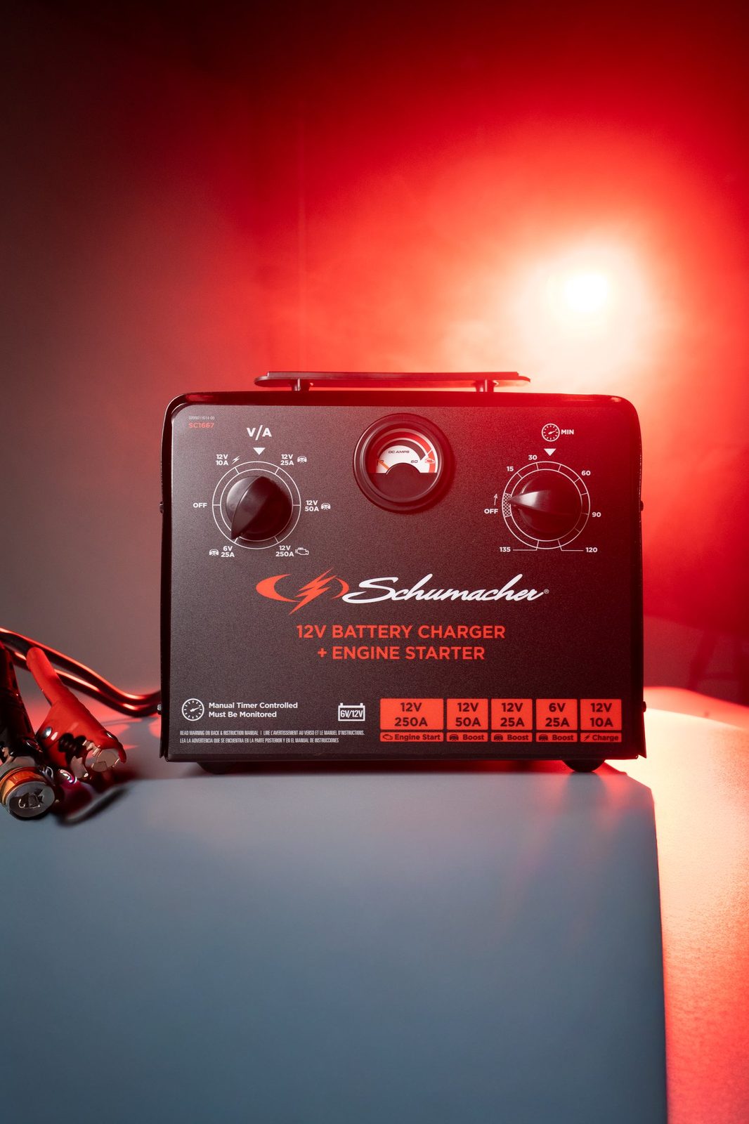 Schumacher 12V battery charger product photo with red backlight