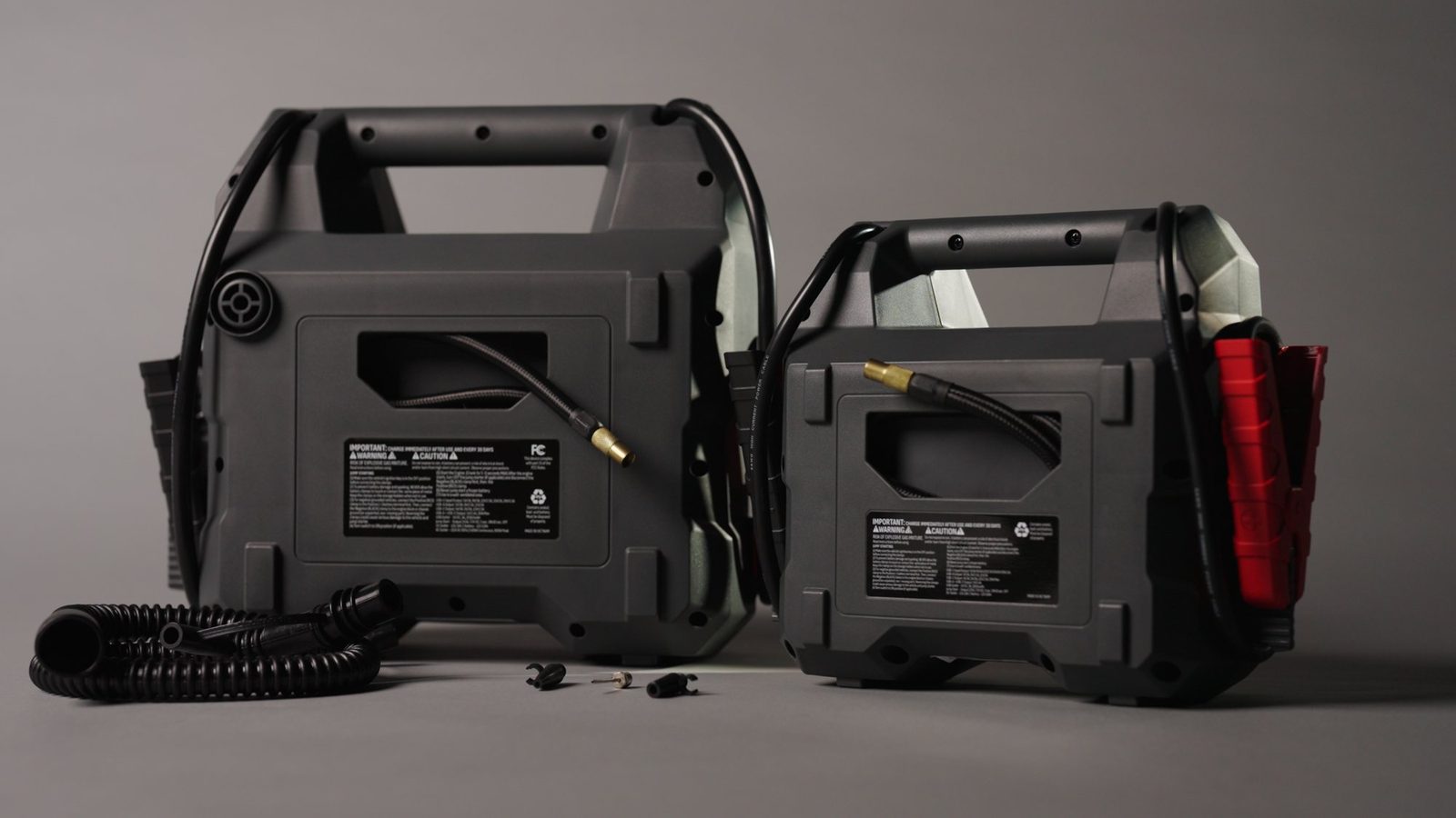 Schumacher jump starters on a gray studio set