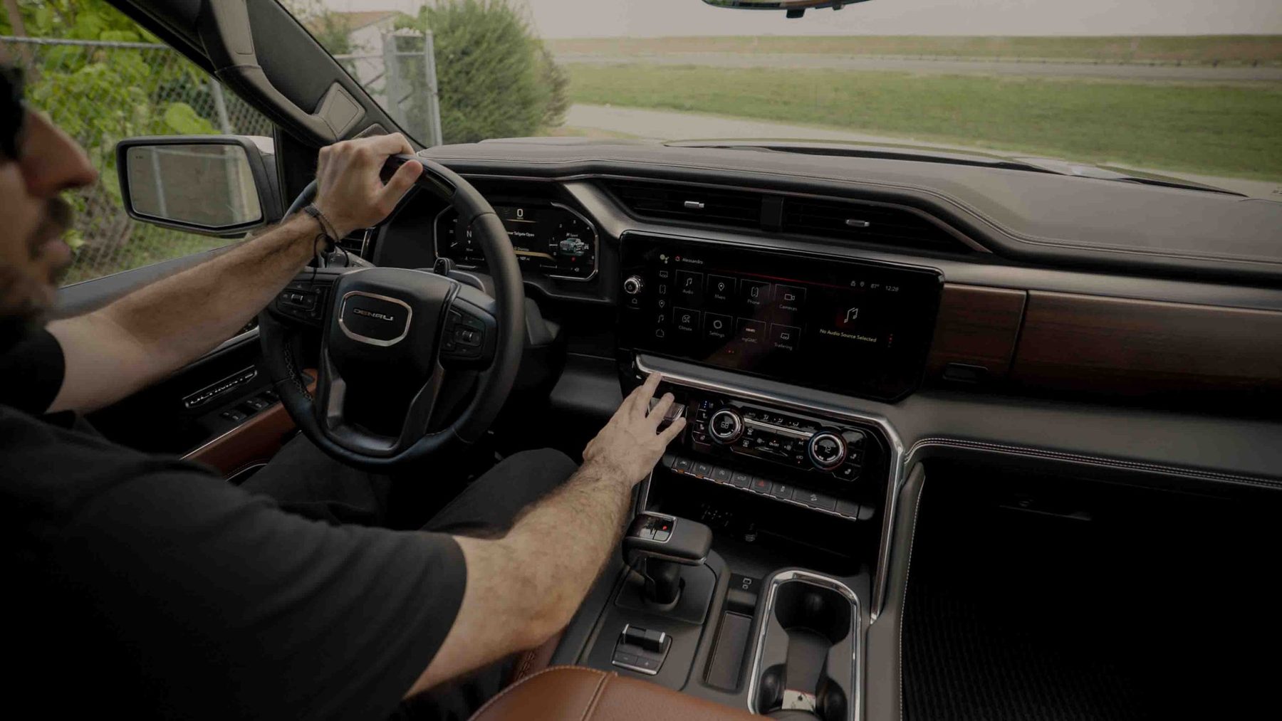 Host at the wheel with the Sierra Denali dashboard
