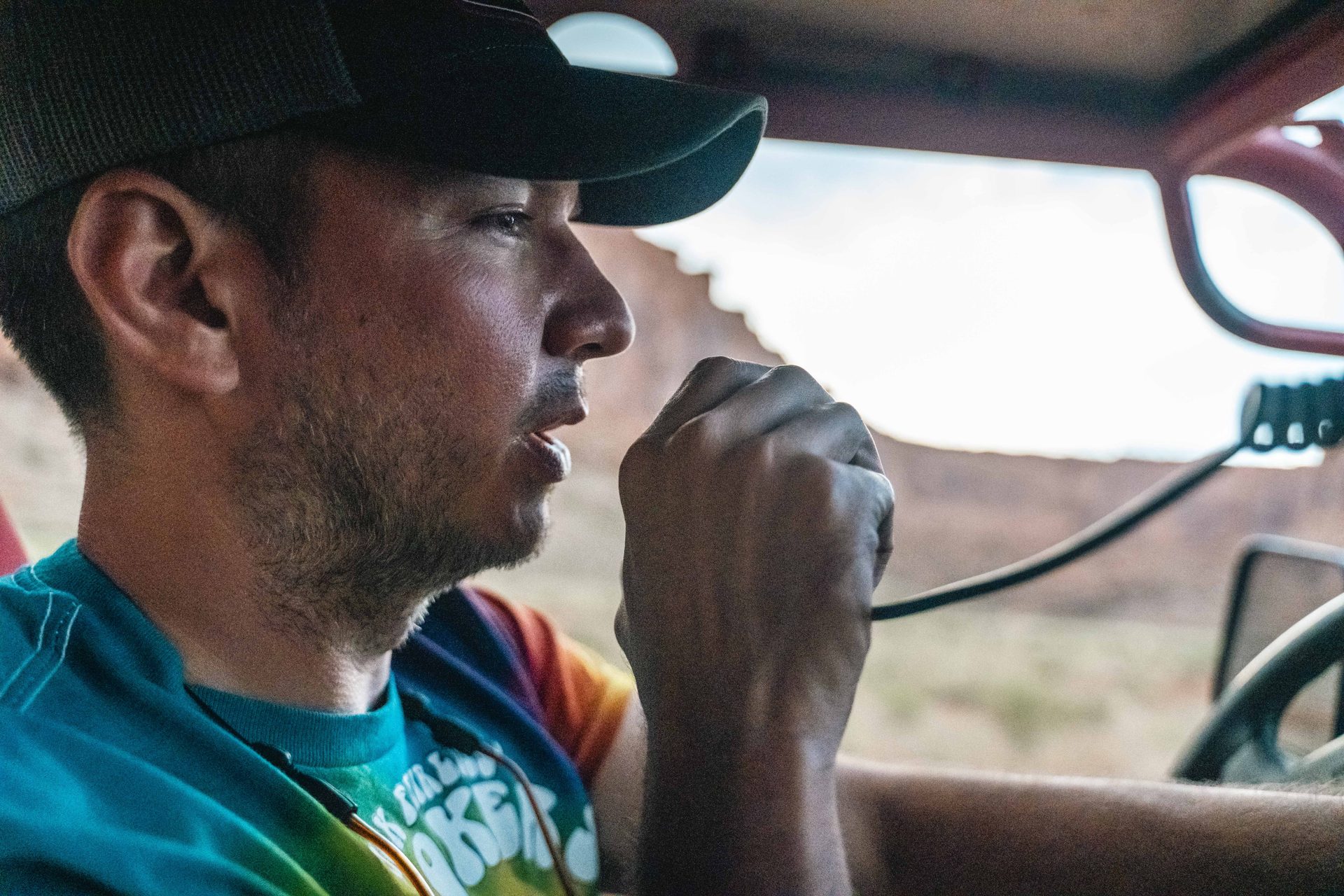 Driver calling the line on the radio from the cab