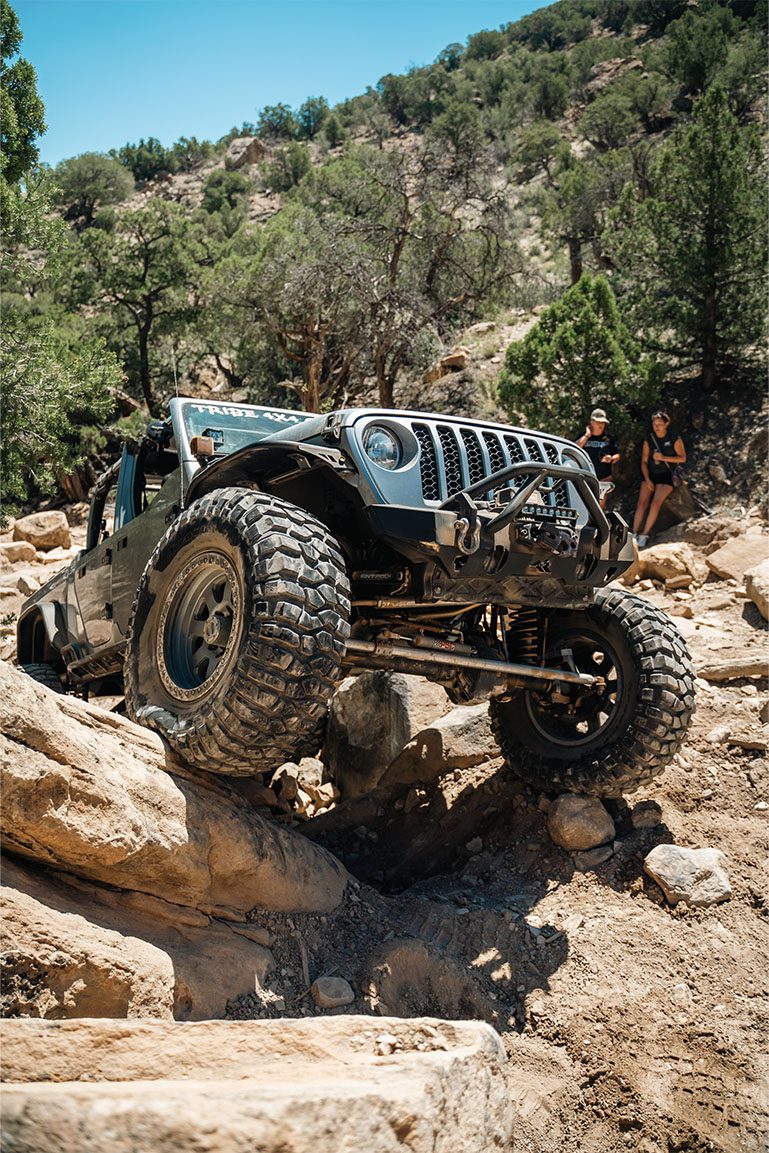 Jeep crawling over a boulder field