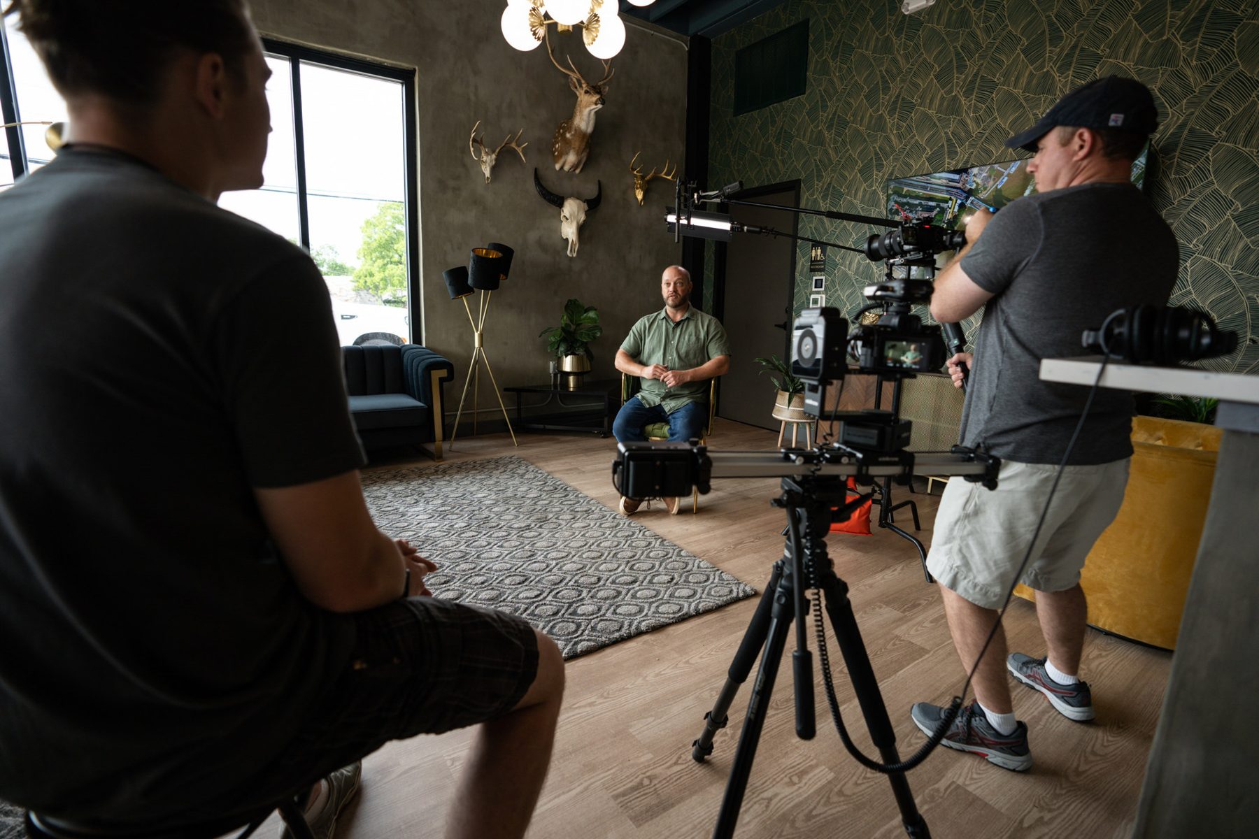 Beowulf Media crew filming a Valley Quest interview in the office lounge