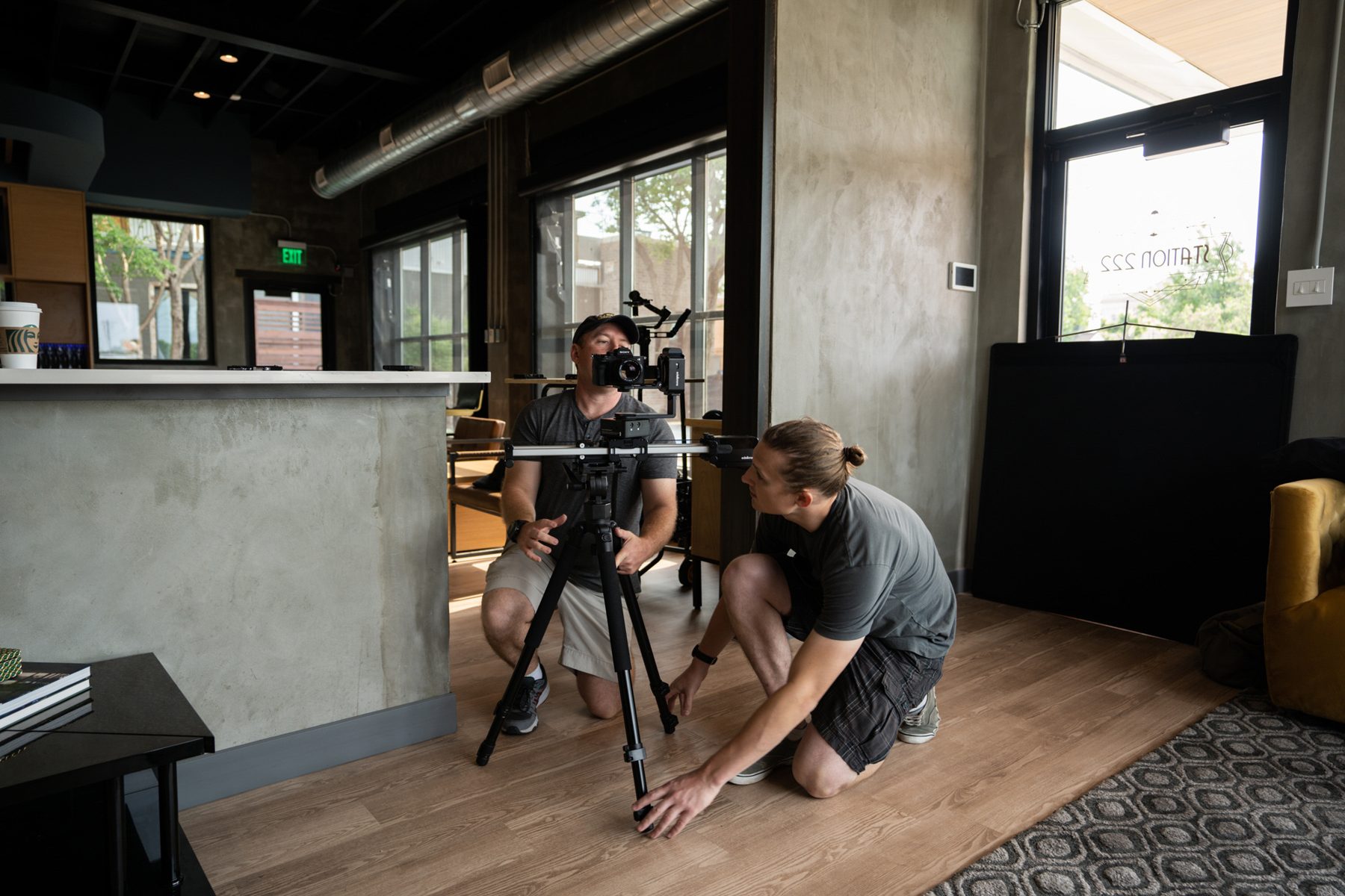 Crew setting up a camera slider in the Valley Quest office